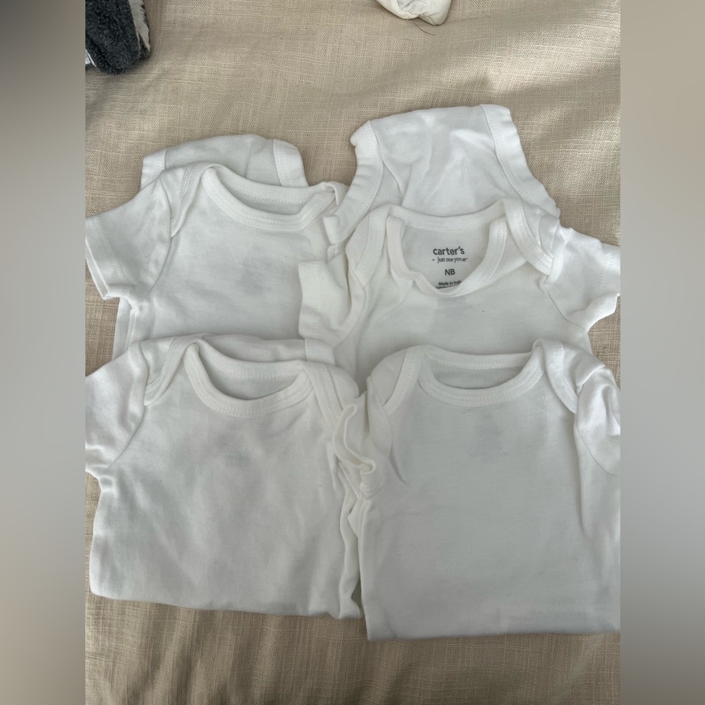 Carter’s 4-Pack White Onesies